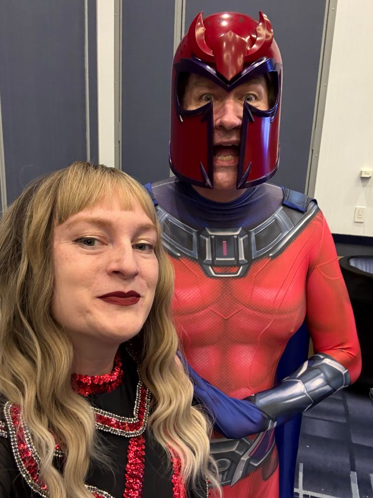 a woman dressed as taylor swift and a man dressed as magneto 