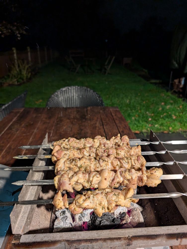 Skewers of shawarma spiced buttermilk marinated chicken on a Thüros T1 with skewer attachment.