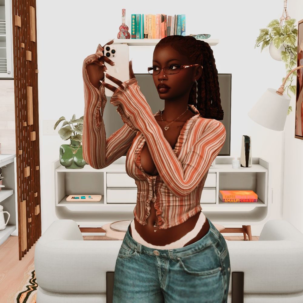 Harmony Dunn (a sim) taking a selfie in her apartment.