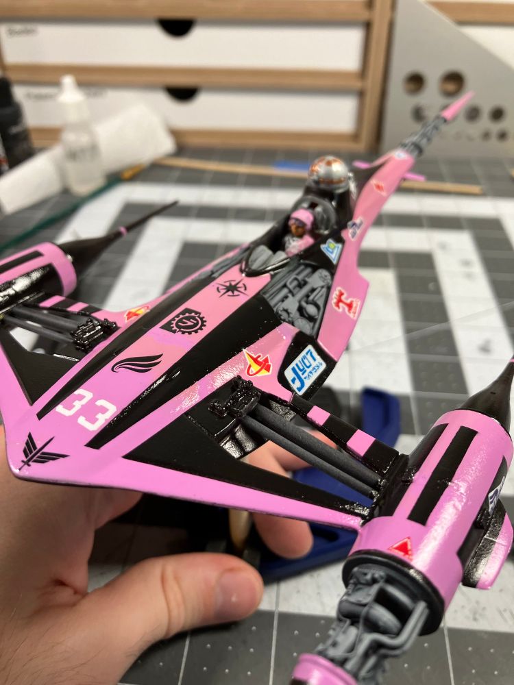 This pink Naboo Starfighter has many many little logos on it