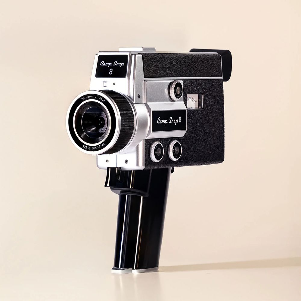 The Camp Snap 8 hand held video camera that looks like a vintage super eight movie camera from the nineteen sixties.