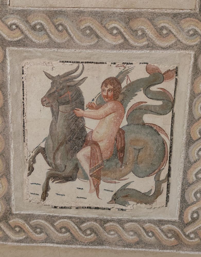 An Eros riding a sea creature