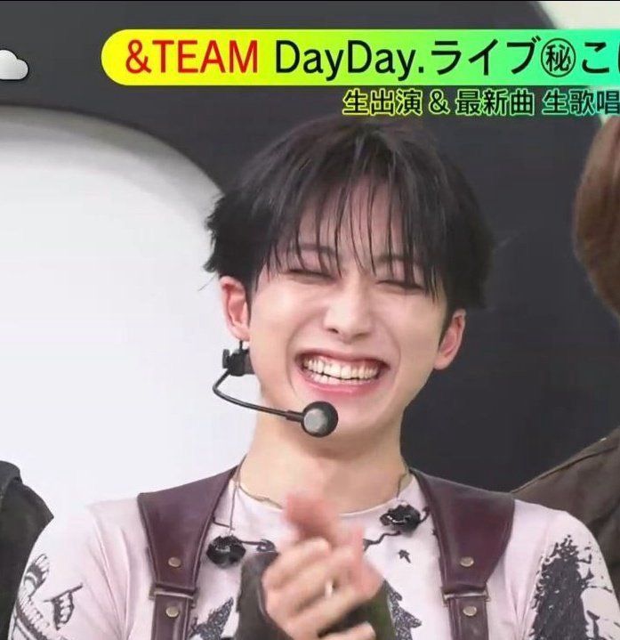 fuma andteam smiling widely w his eyes closed