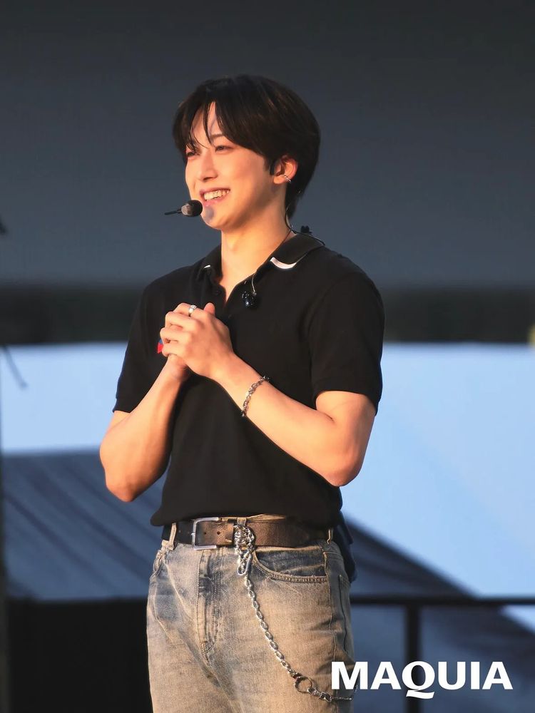 fuma andteam standing and smiling