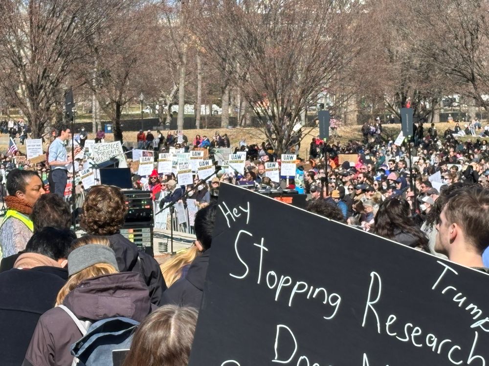 Itai Yanai speaking in front of thousands of participants at the Stand Up for Science event in front of the Lincoln Memorial in Washington, D.C.