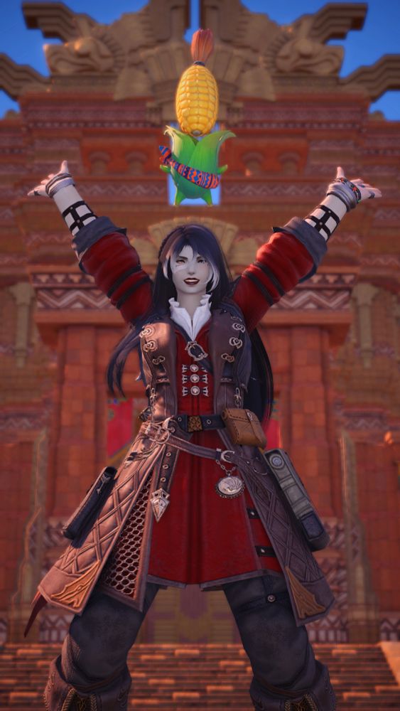 Kira jumping for joy with the one and only holiest of holies, the Cornservant. May corn (and corn based dishes) be upon you aplenty.