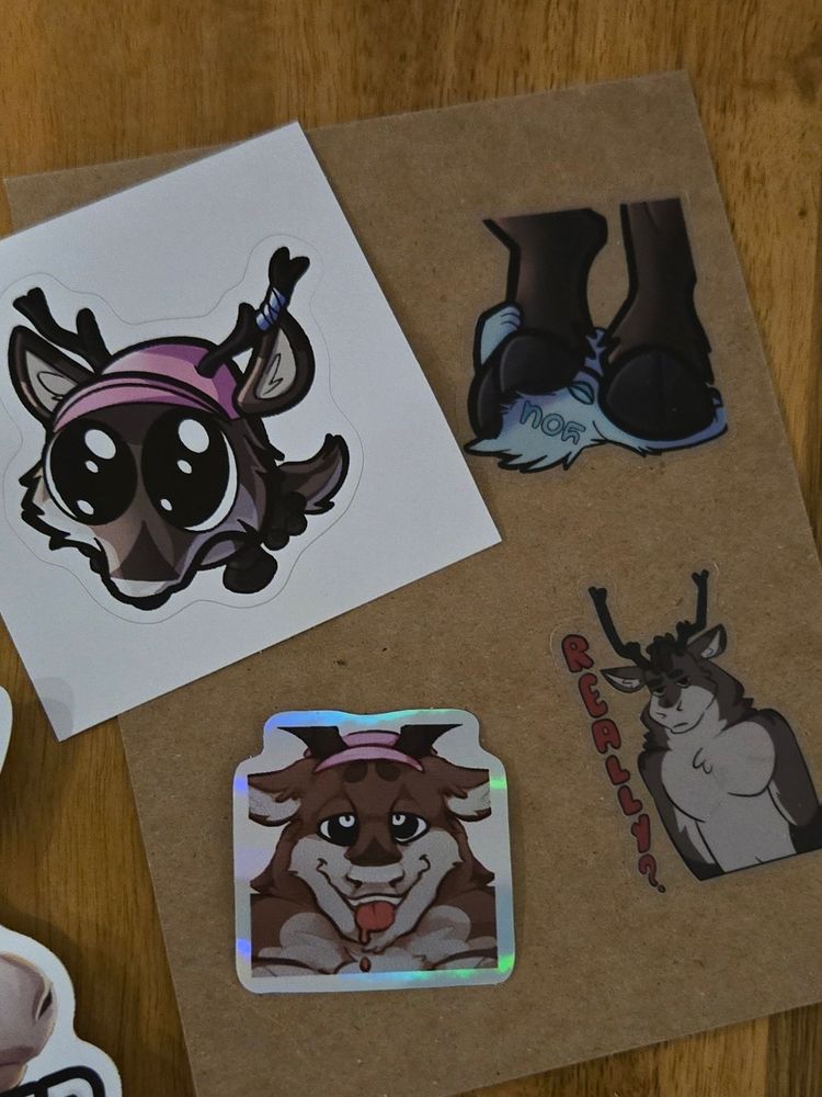 Various stickers of a Reindeer fursona 