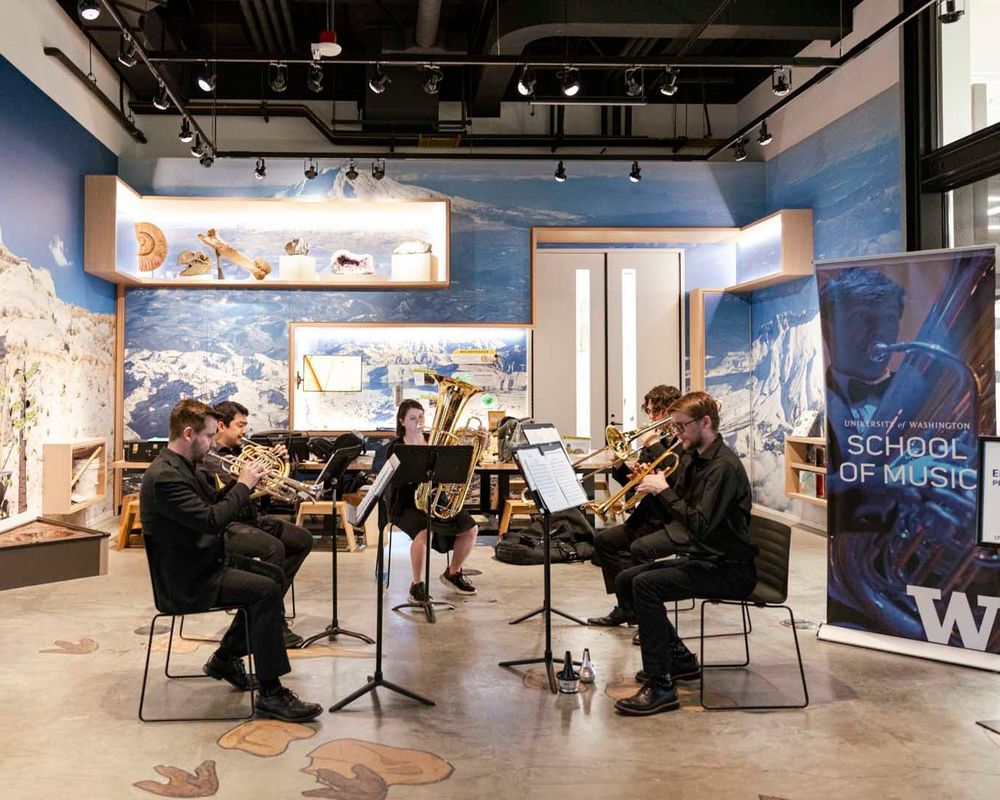 UW School of Music students' pop-up concert at the Burke Museum during Admitted Student Day in Spring 2024