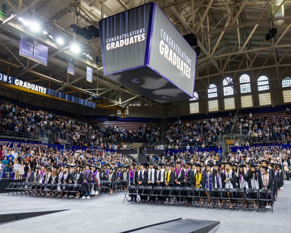 Husky grads at the Department of Biology graduation ceremony in the Alaska Airlines Arena on the University of Washington Seattle campus