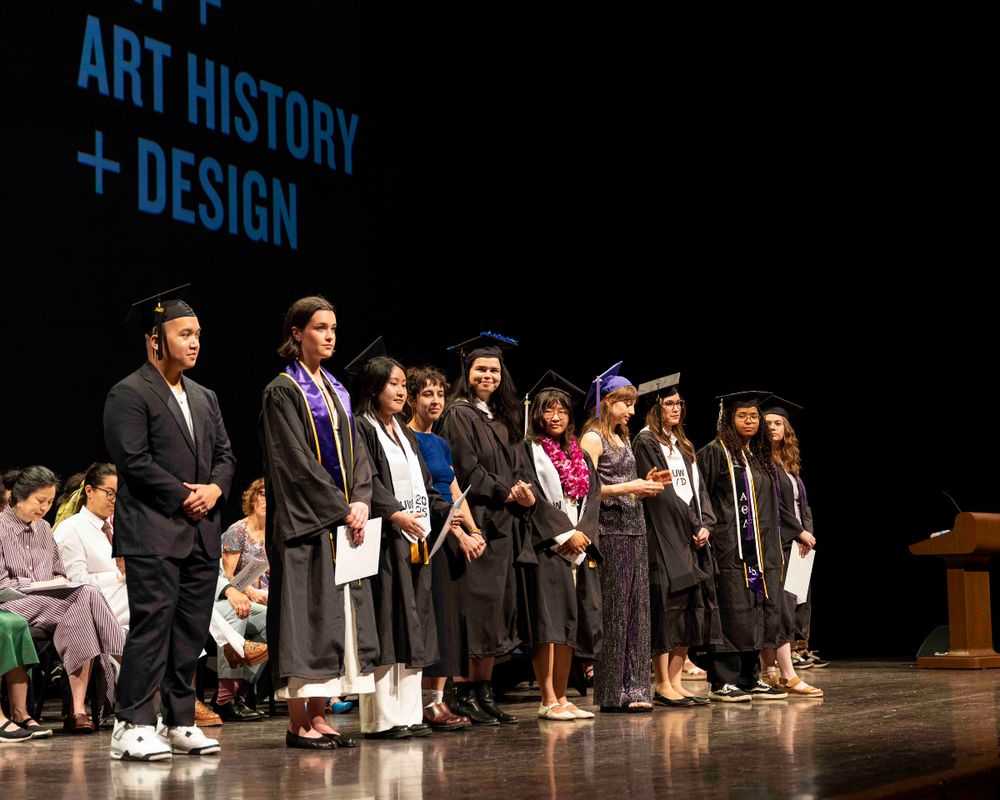 Husky grads at the School of Art + Art History + Design graduation ceremony at Meany Center on the University of Washington Seattle campus