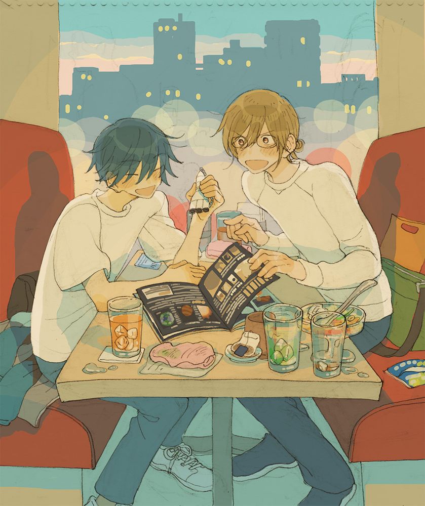 いろいろ飲み食いした机でパンフみて喋ってる
