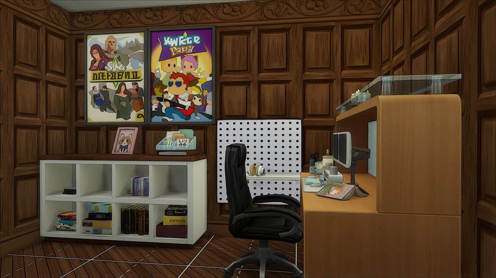 A cute little pc gamer area made in the sims. there is a cubby accent table with various games in the cubbies and a picture of kitty cat with a planner and other papers in a container on the cubby. On the wall above is posters for sims medieval & a mysims game. there is also a peg board with a shelf in line with the desk on the perpendicular wall that has the headphones for the gamer settup.
On the desk is a 2 monitor pc(which comes with a mini mic, mouse and keyboard), a cute boba inspired mug, a holder for pencils & other stationary & an open book that seems to have put down using the desk as the bookmark