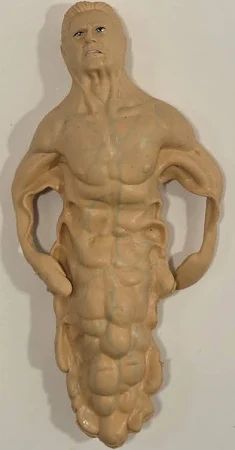the most upsetting toy of all time: a small and horrible statue of melting, nude Senator Kelly from the first x-men film