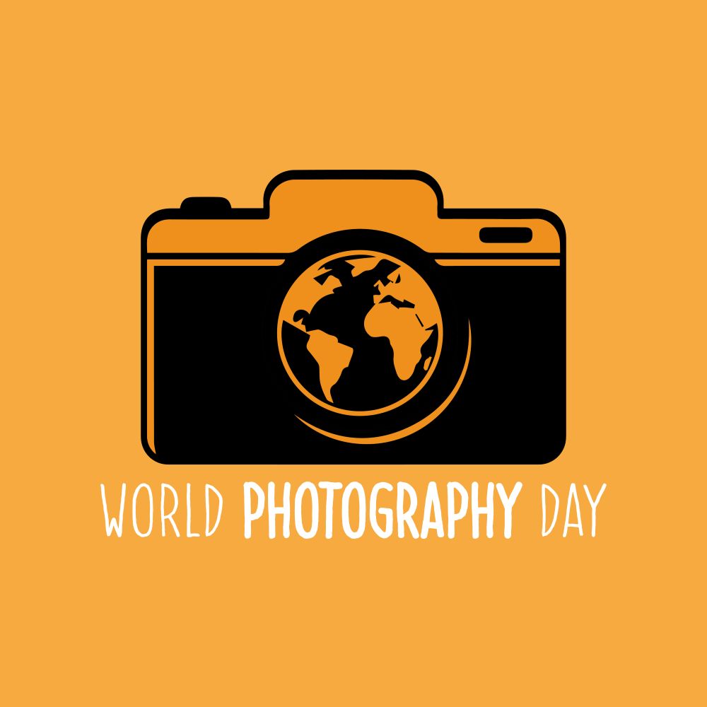 This square design is mostly yellow-orange with a stylized drawing of a classic reflex camera with a rectangular body and a round lens at the center, where we see a stylized map of the Atlantic and its surrounding continents. The words say “WORLD PHOTOGRAPHY DAY.” Design by “aw91,” licensed from 123rf.