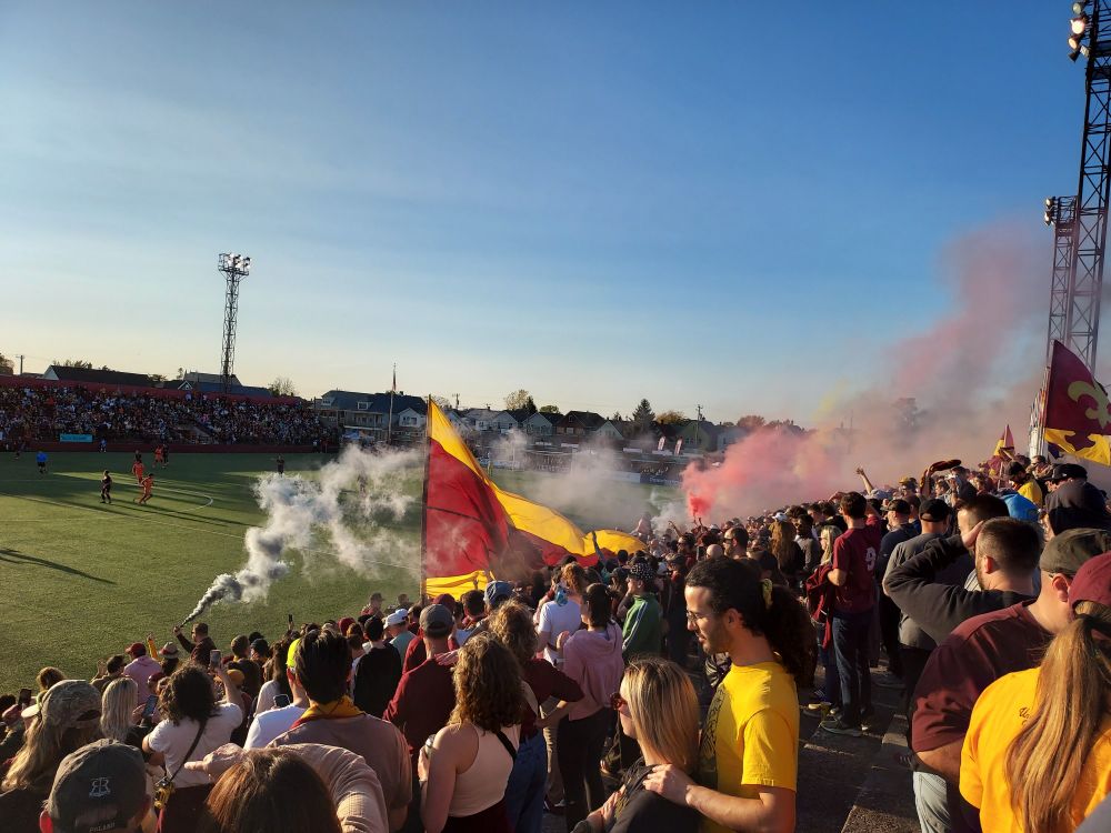 Detroit City FC supporters celebrating a goal