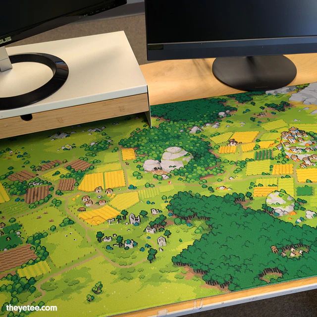 Deskmat of a pixel-art scene from Arco