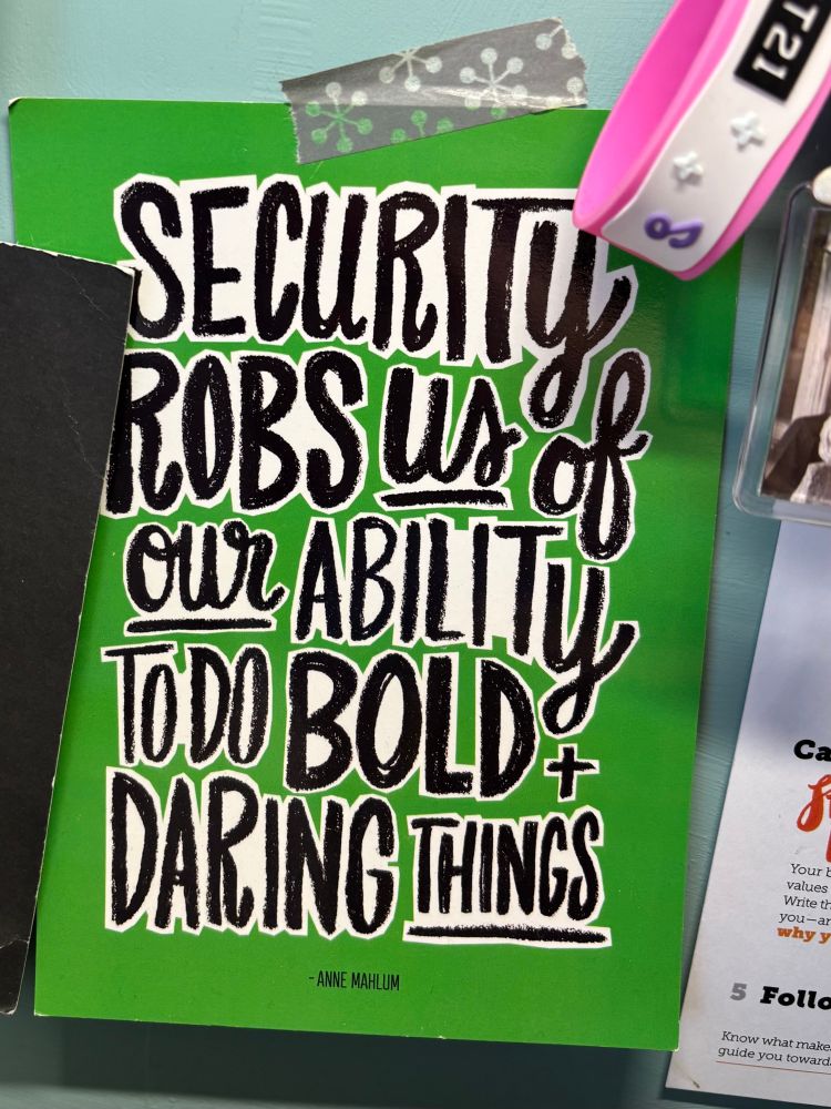 Green postcard with white and black handlettering saying: security robs us of our ability to do bold and daring things. Quote by Anne Mahlum