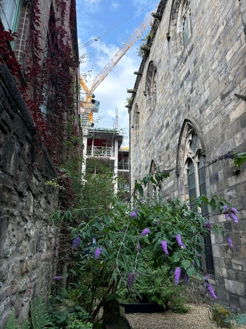 Trinity apse showing nearby development