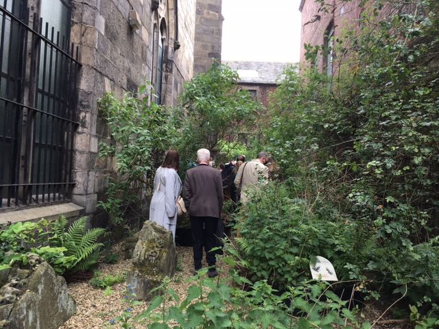 Trinity apse open day- fighting the weeds to see the wonderful stones