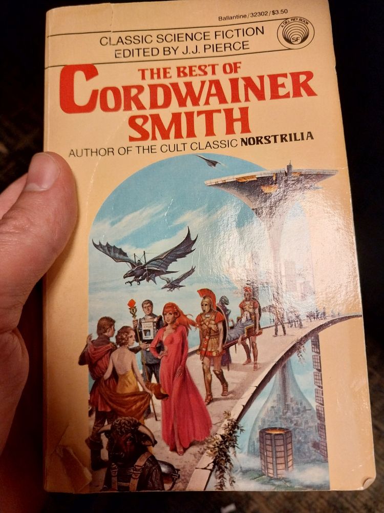 photo of a book in my hand:
The Best of Cordwainer Smith
ed. J.J. Pierce