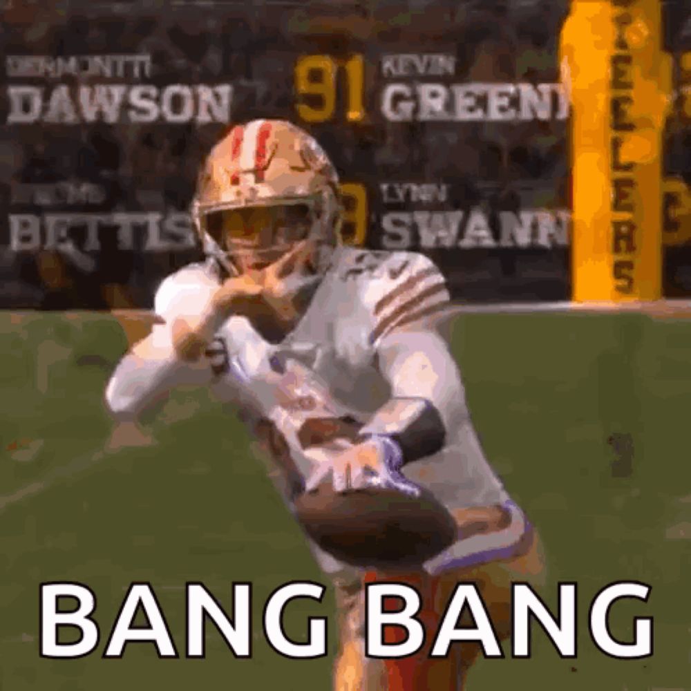 a football player is running with a ball on a field and the words bang bang are on the screen .