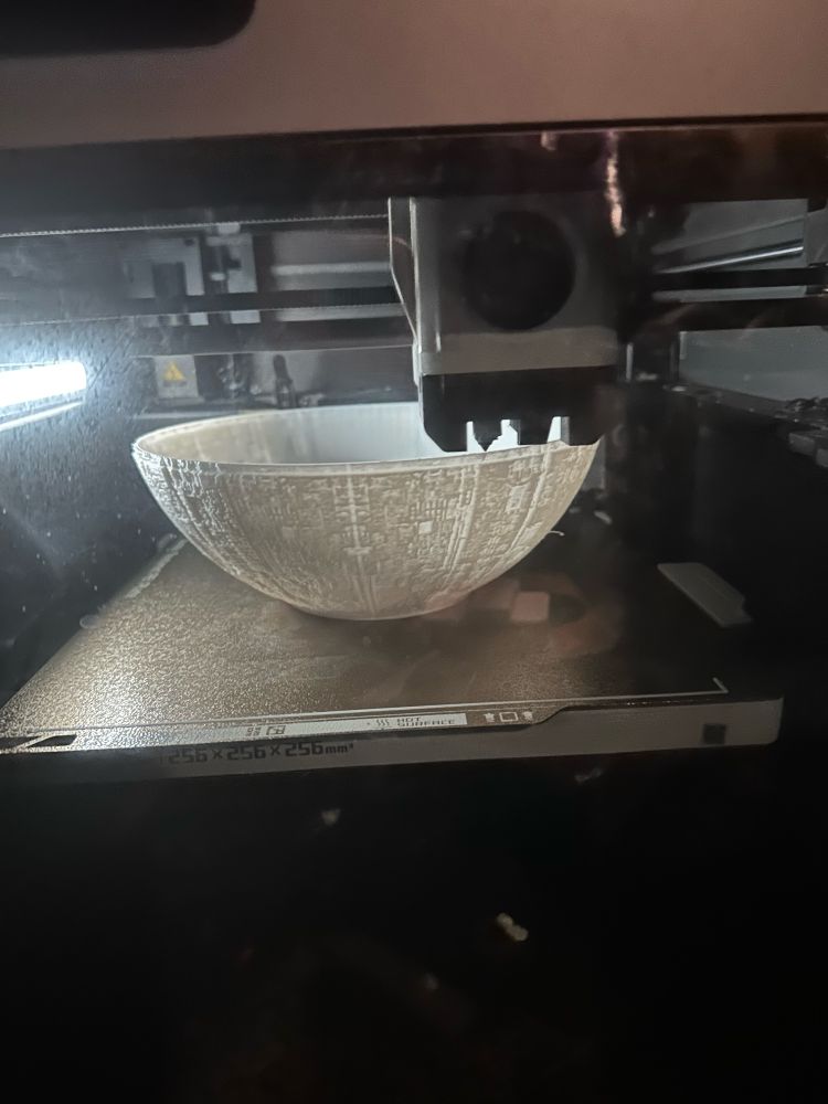 A 3d printer creating the Death Star 