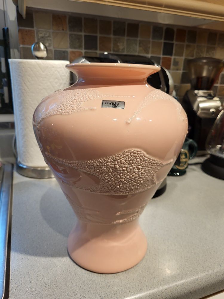 Haeger urn style vase in a peach glaze with splashes of crackle glaze in places, still with the original Haeger factory sticker.