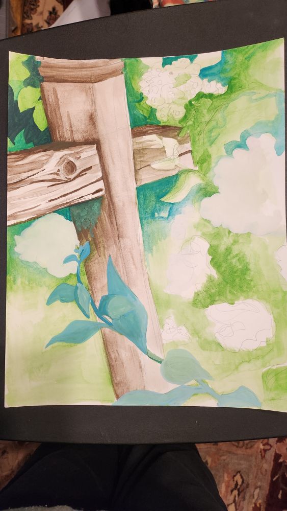 A work in progress gouache paintings of a wooden post surrounded by leaves.