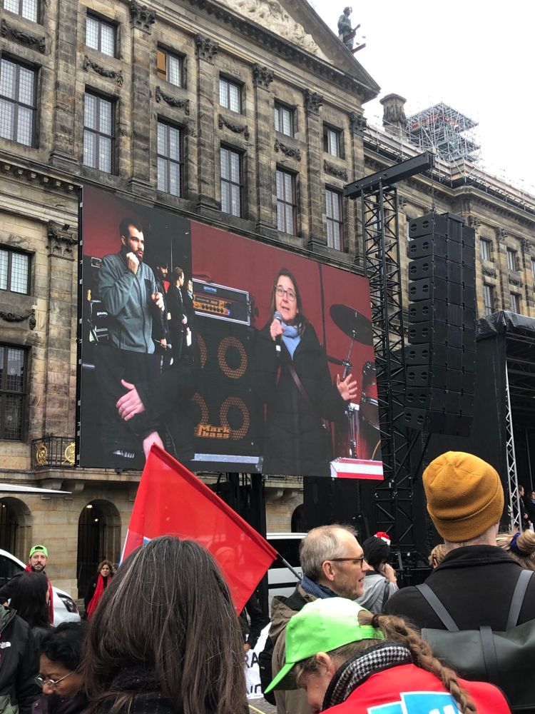 UT philosophy professor Julia Hermann giving a talk in Dam Square 