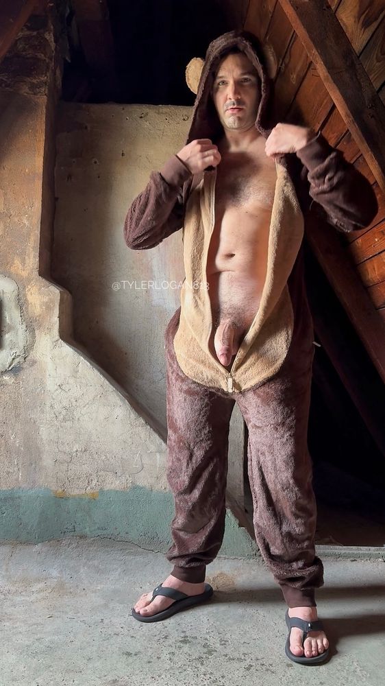 Tyler wearing a full suit monkey costume and flip flops; having the costume unzipped, hairy chest exposed, big, thick, heavy dick hanging out in the open.