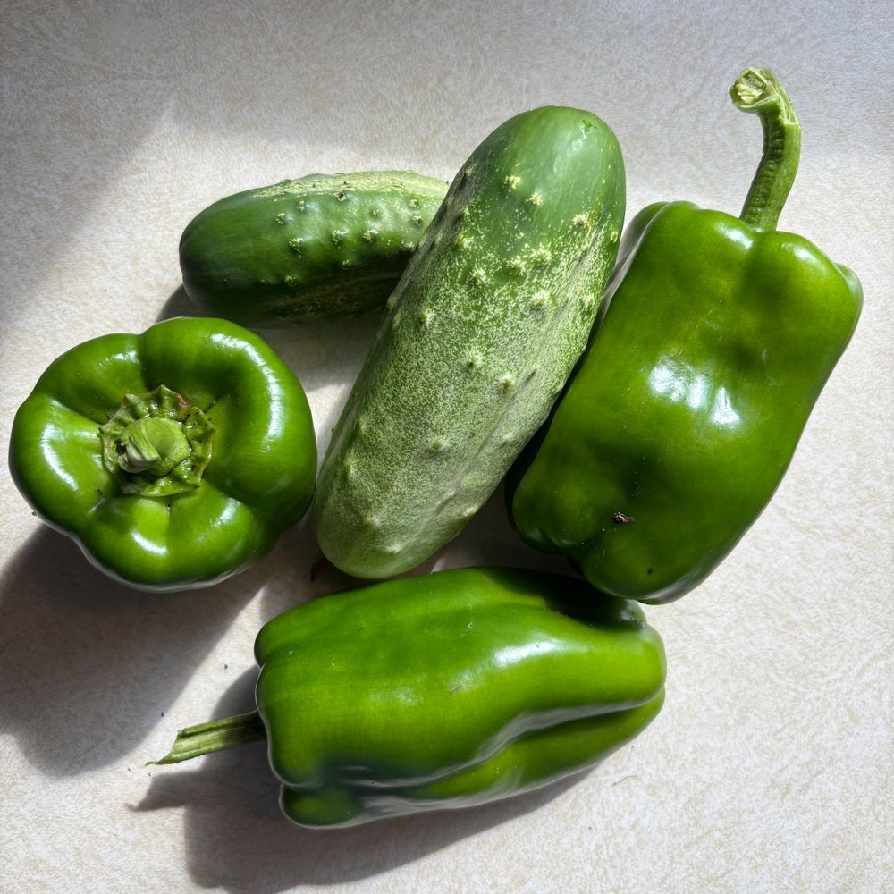 two cucumbers and 3 bell peppers