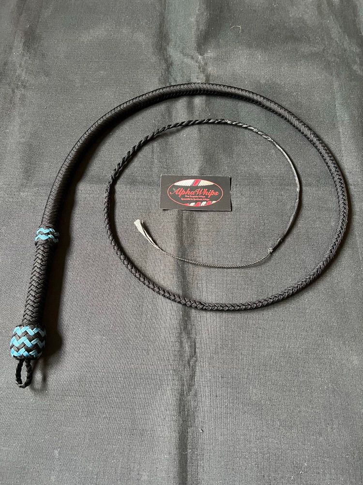 A picture of a 4ft junior series bullwhip. It has a 6 inch handle with Carolina blue details in the knots, a twisted nylon fall with a cracker loop for easy cracker swaps. The cracker is made from dyneema. 