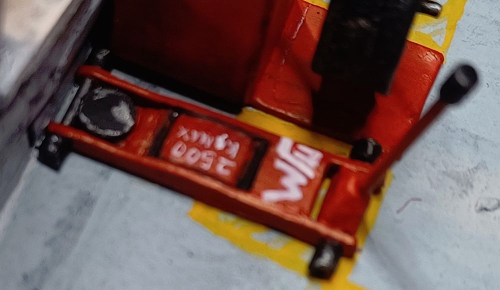 This is the low-profile trolley jack; although I struggled to get the focus right for the photo I really like this item.