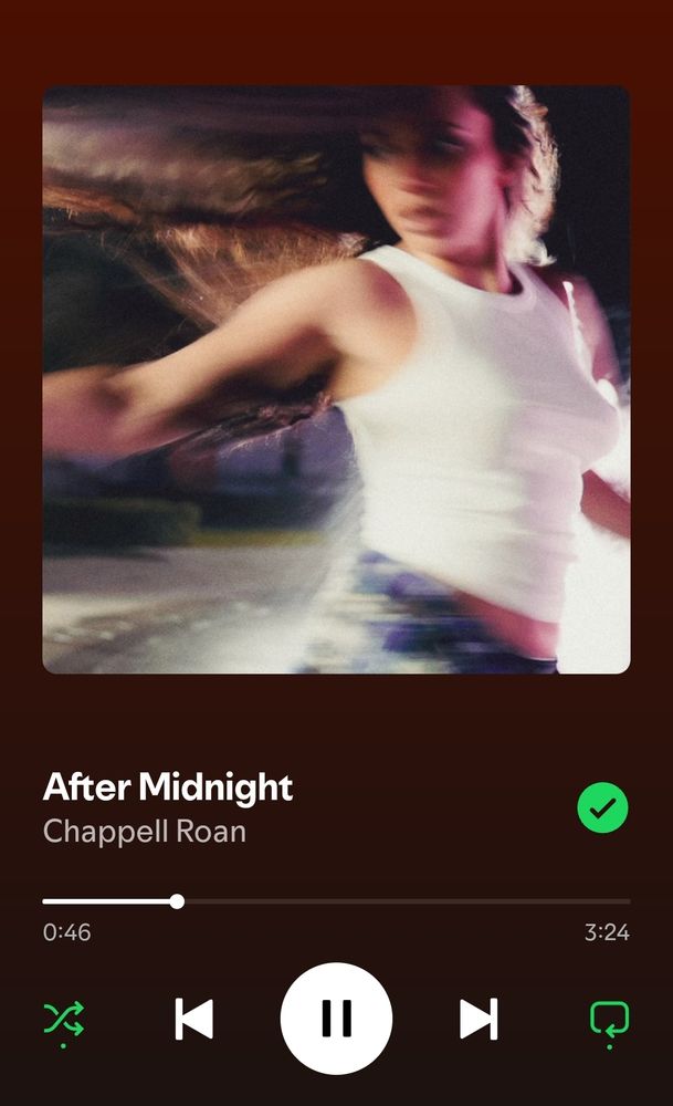 A screenshot of spotify having a glitch showing after midnight by chappell roan with the cover of midnight cowboy by jade