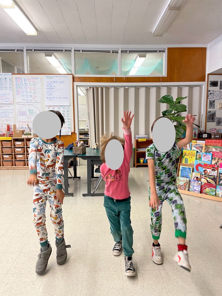 Children following instructions as teacher asks them to use different speeds, levels, lines, etc. while trying out the Play-Doh verbs