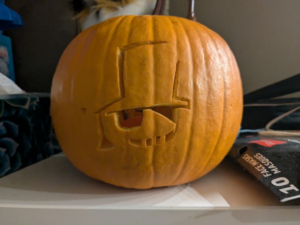 A jack-o'-lantern with kaito kid's insignia carved into it.