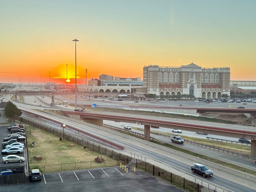 View of Lubbock at sunrise, including Jones-AT&T Stadium and Texas Tech University