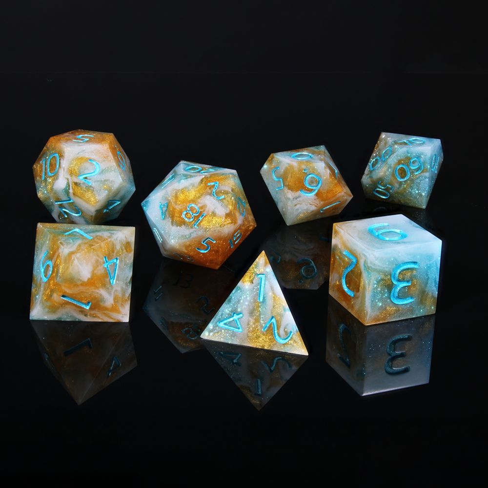 These are 7 polyhderal dice. They are a swirled, cloud like mix of orange, blue and white. The numbers are painted a pale blue
