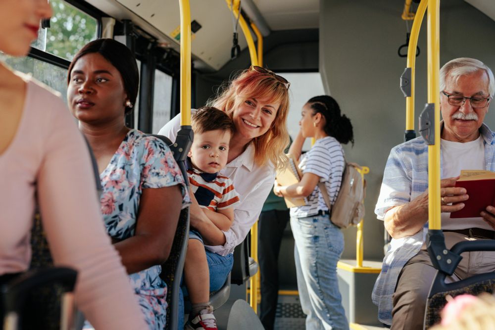 Passengers enjoying a bus trip.
