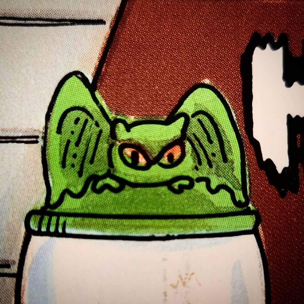 A little green gargoyle lamppost topper, from the cover of HAPPY HAUNTING! HALLOWEEN COSTUMES YOU CAN MAKE (c. 1986, illustrated by Renzo Barto). 