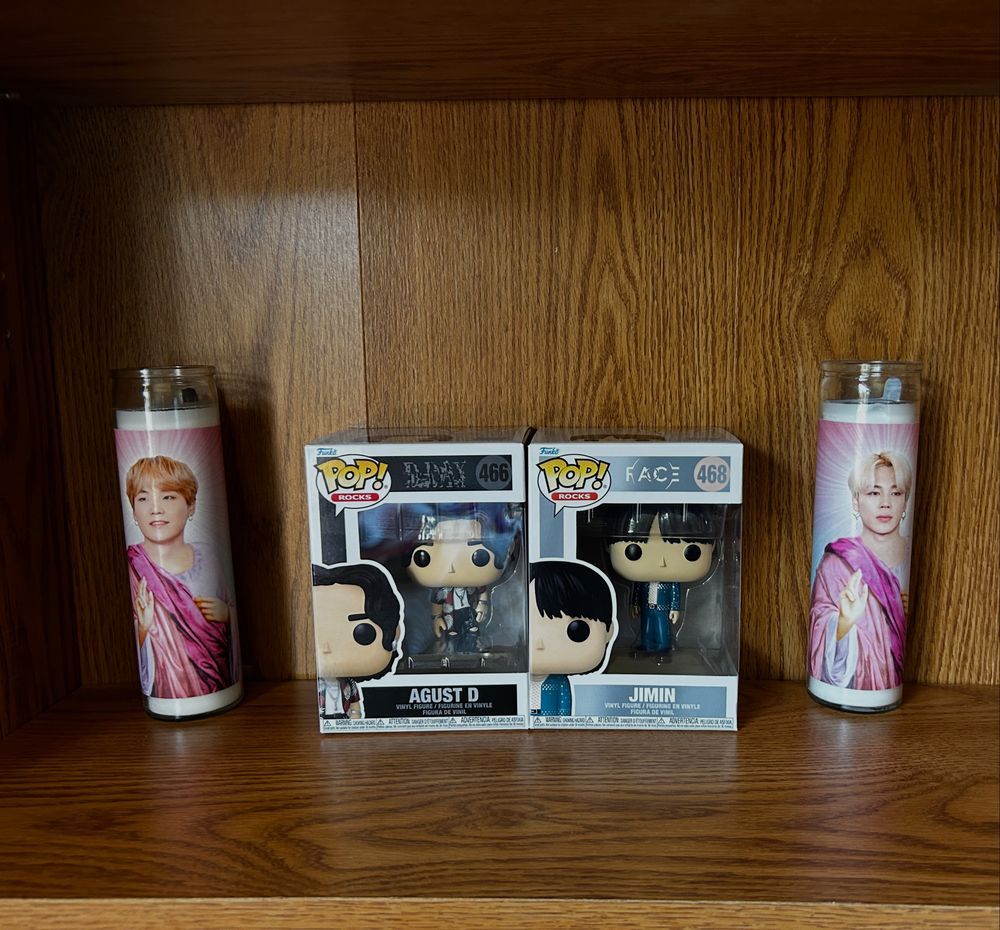 Left to right - BTS Suga Jesus candle, August D Funko Pop, Jimin Funko Pop, Jimin Jesus candle. 