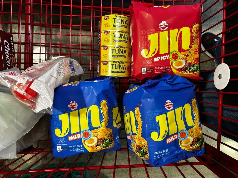 Shopping cart with Jin Ramen in mild & spicy along with A set of 4 Dongwon tuna cans. 