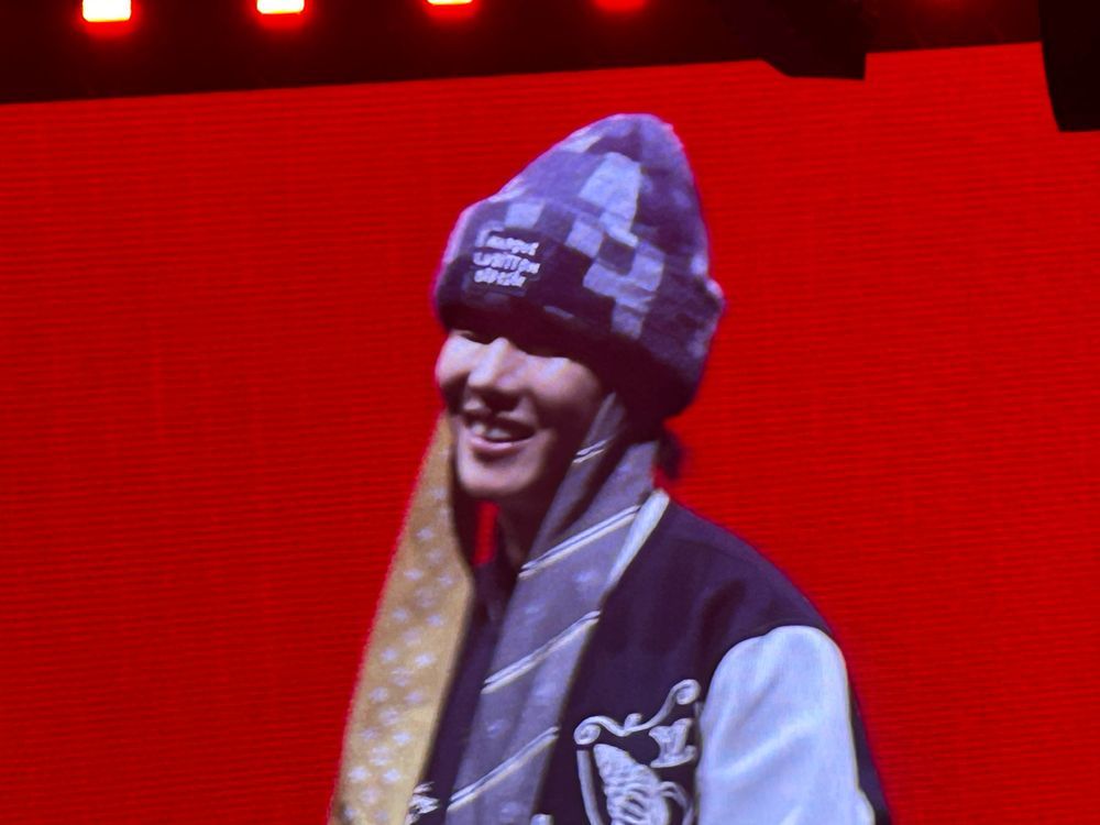 JHope in a knitted checkerboard beanie