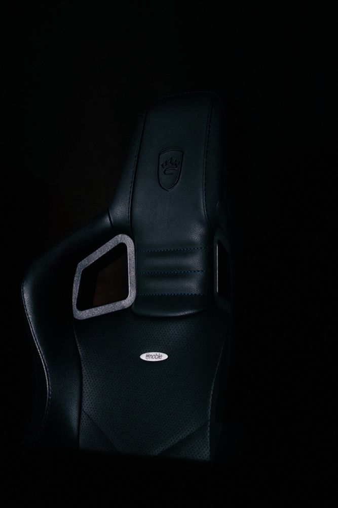 A black noblechairs gaming chair. 