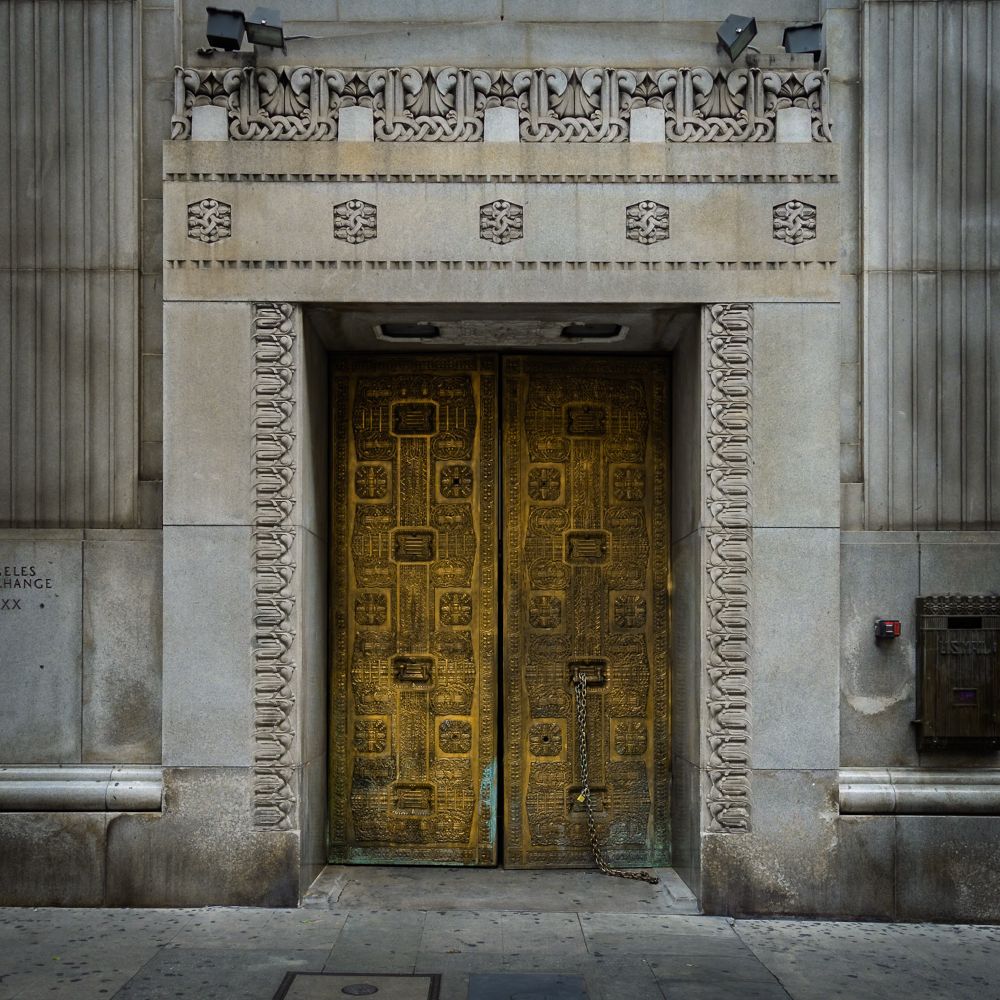 Street view of old (this New Yorker is assuming) LA Stock Exchange. The ornate bronze doors are oxidized evoking former grandeur.