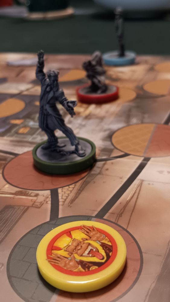 One of Sun Wukong's clones with Houdini, Little Red, and the Invisible Man lined up in the background on the Cobble and Fog Soho board.