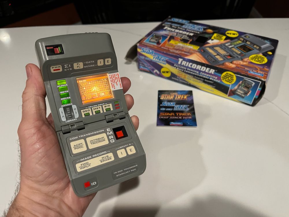 I’m holding a Playmates Star Trek: The Next Generation tricorder from the 1990s.