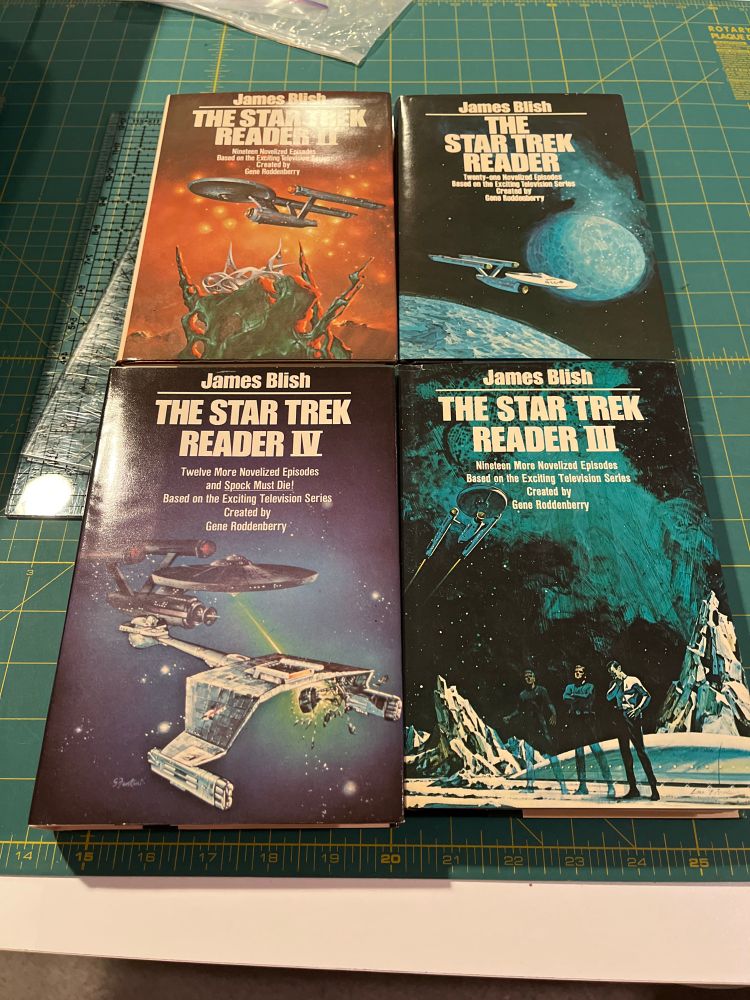 All four volumes of the Star Trek Readers by James Blish. 