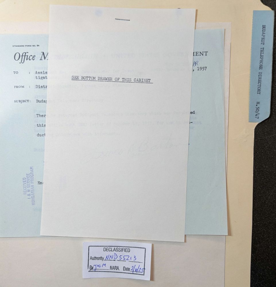 File folder noting that a telephone directory was stored elsewhere in the file cabinet, but apparently it was not accessioned to NARA with the rest of the collection.