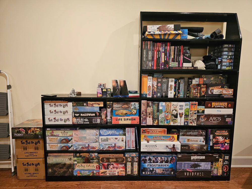large black shelves completely stuffed with board games